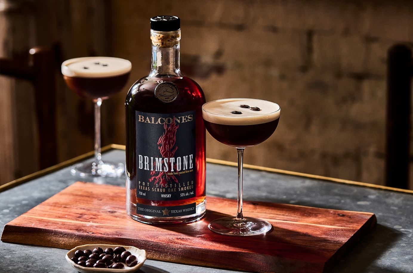 Bottle of Brimstone Smoked Whisky with Espresso Martinis on Table