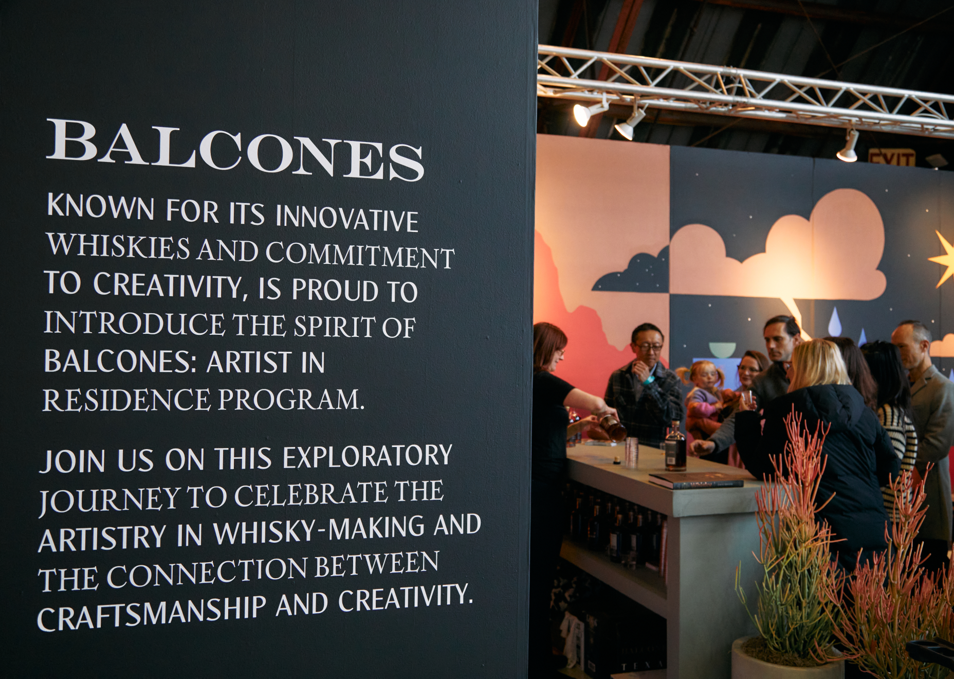 Balcones signage with bar in background