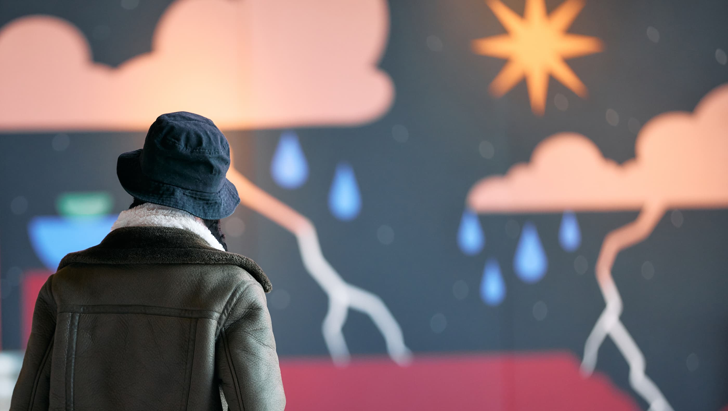 Someone looking at mural