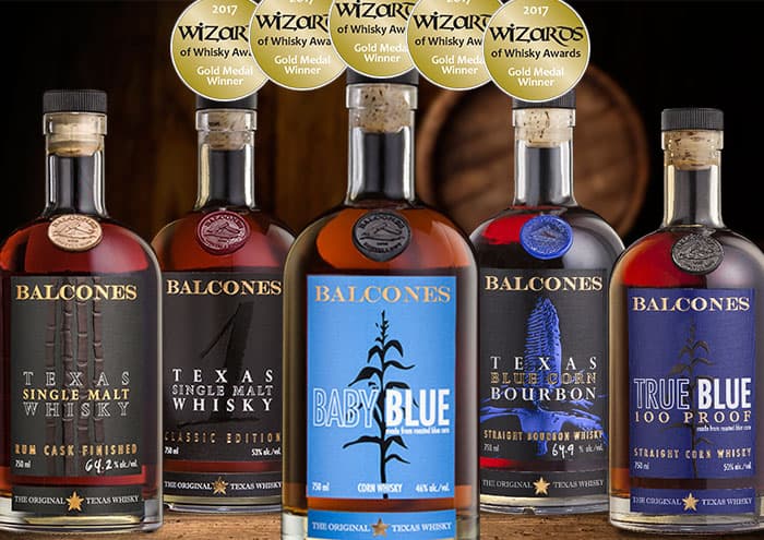 Various Balcones bottles with awards
